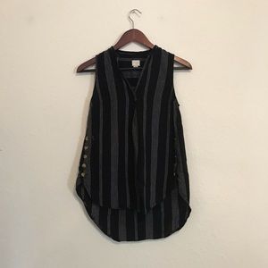 Black sleeveless blouse with white pin stripes
